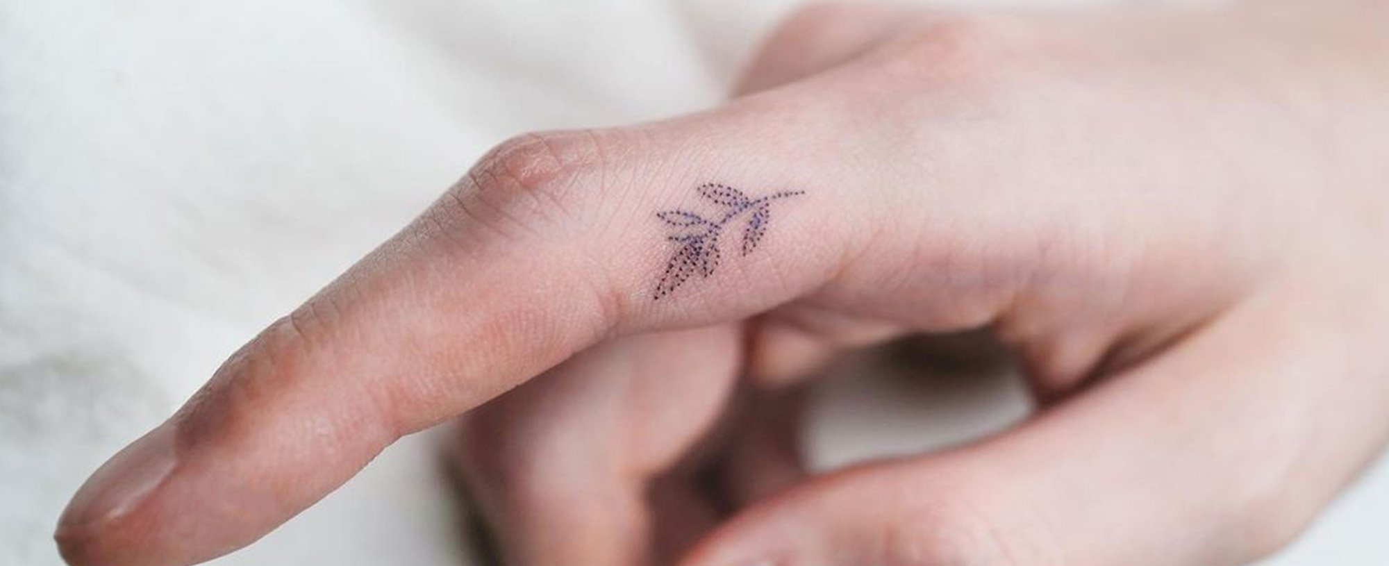 Finger Tattoo