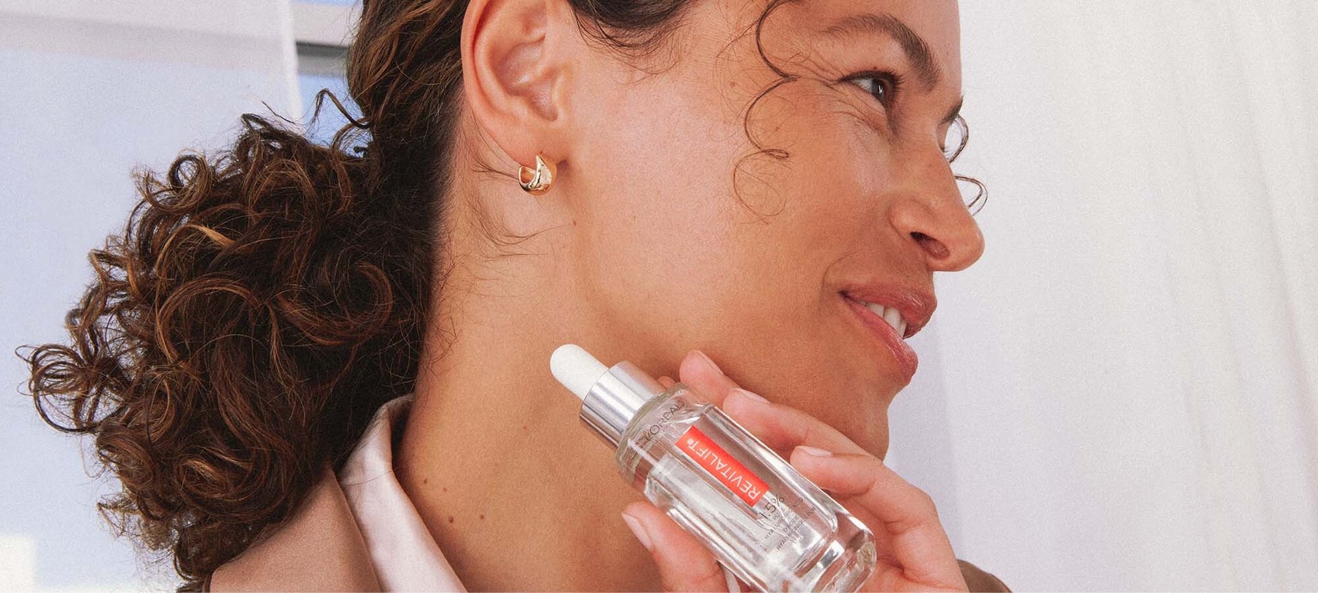 Person Holding Revitalift Hyaluronic Acid Serum